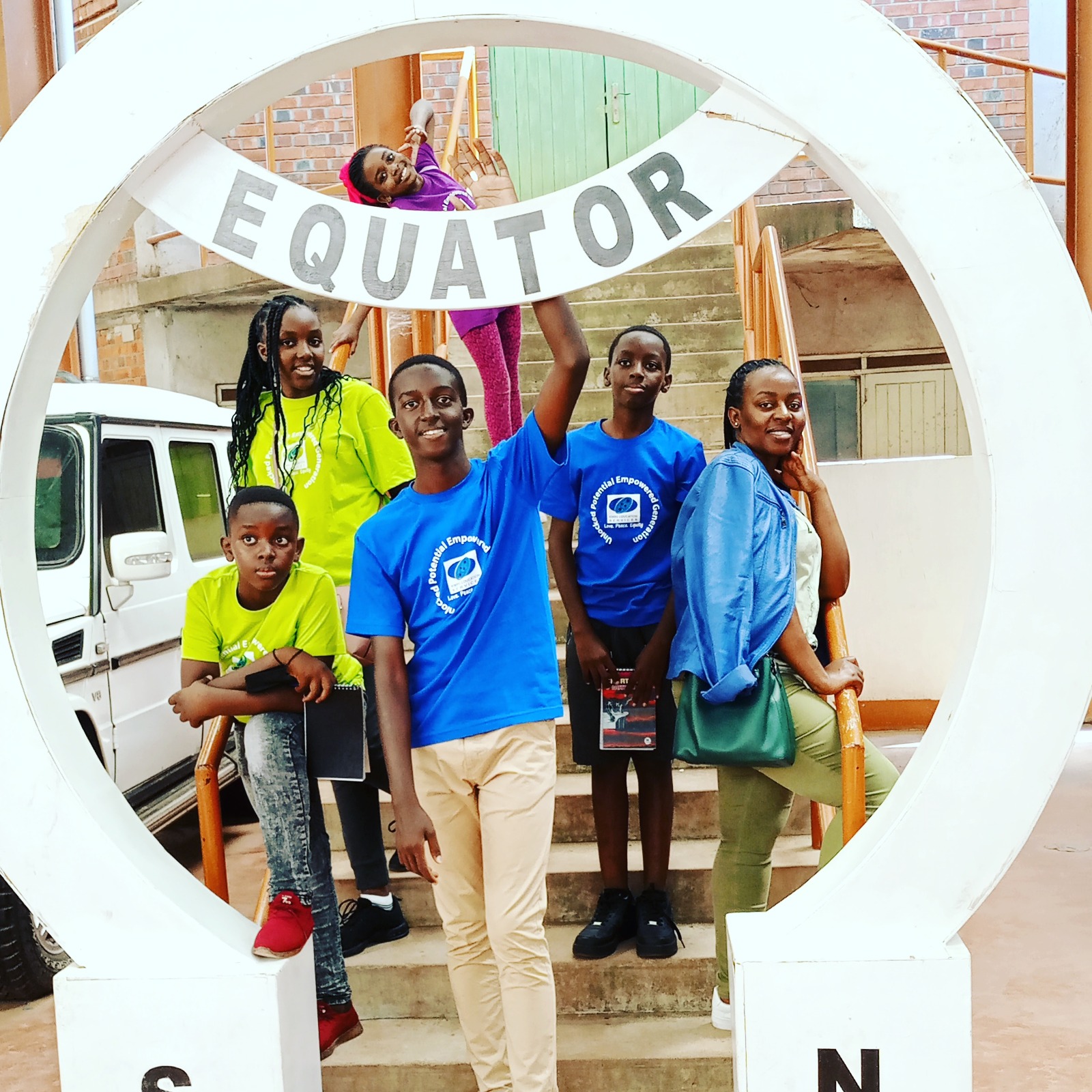 Children at the equator in Kasese